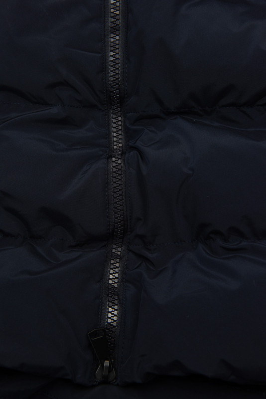 Tmavě modrá dlouhá prošívaná vesta