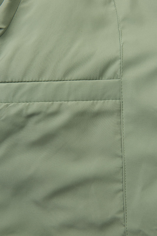 Nefritově zelená prošívaná zimní bunda v prodlouženém střihu