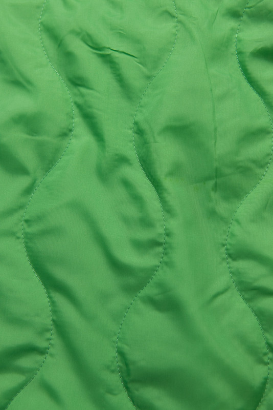 Zelená vesta se vzorem