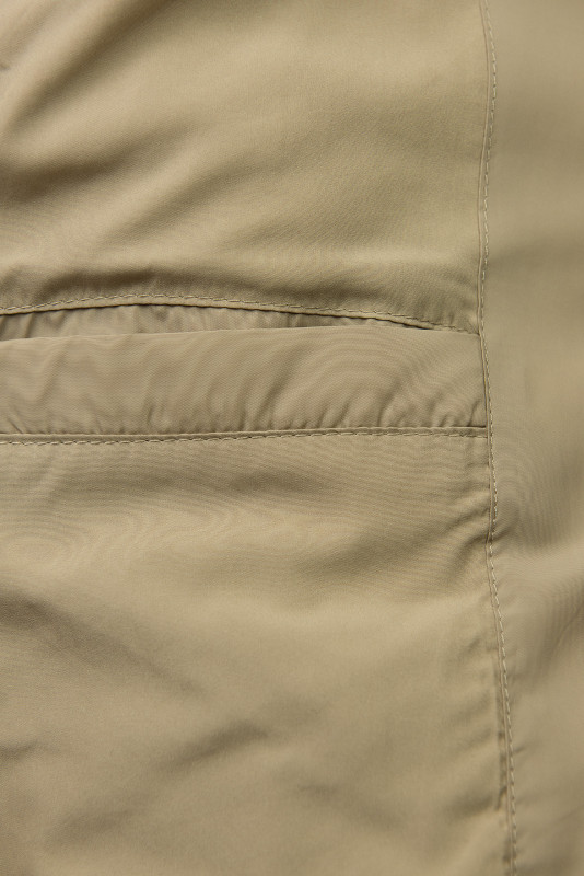 Béžová prošívaná bunda s páskem