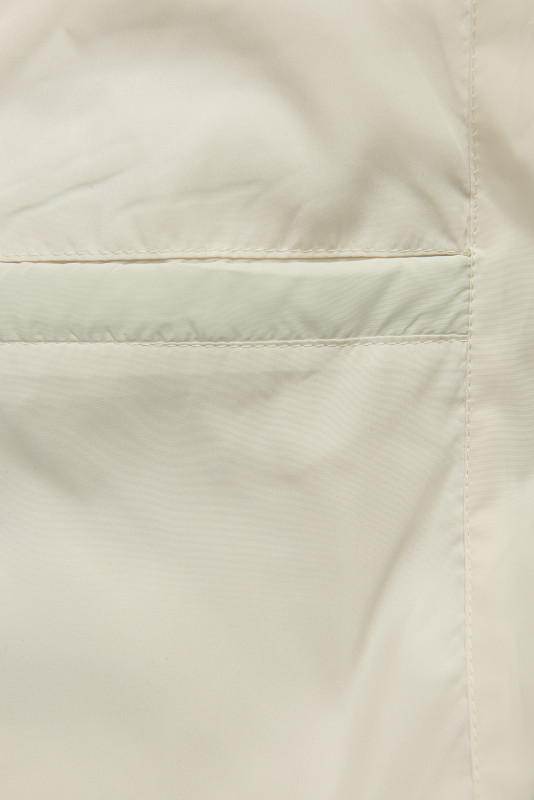 Ecru přechodná bunda s pletenými rukávy