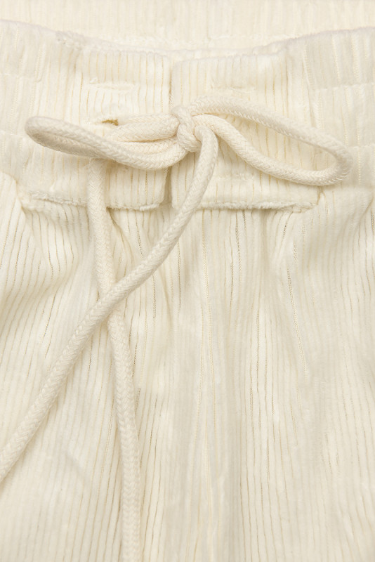 Ecru kalhoty se šněrováním v pase