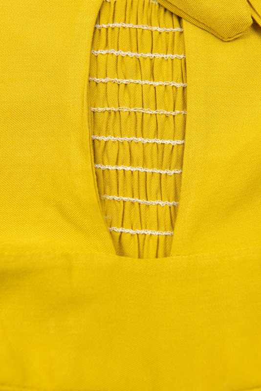 Žlutý kalhotový overal