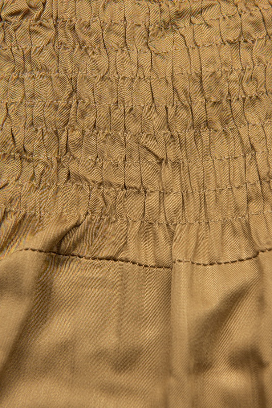 Pískově hnědý kalhotový overal