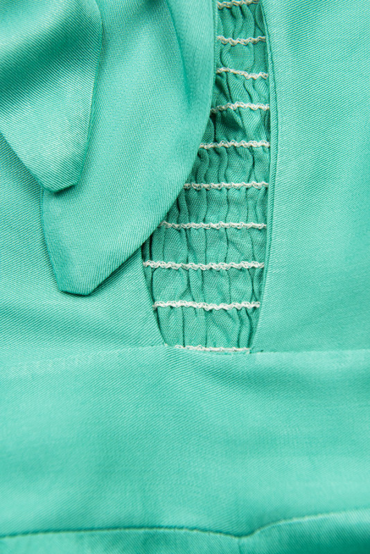 Tyrkysově zelený kalhotový overal