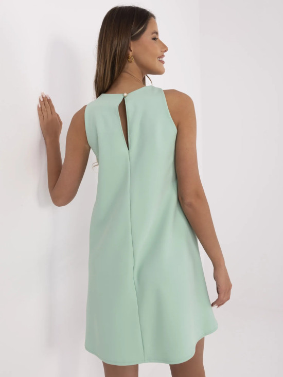 Elegantní pistáciová koktejlová šaty