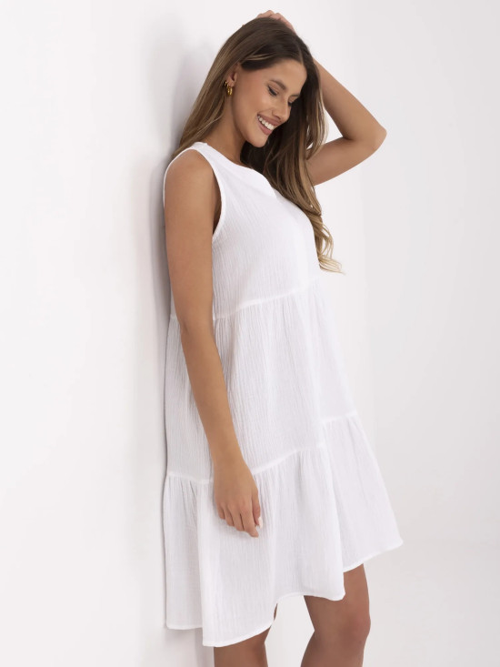 Bílé rozšířené šaty s volánem