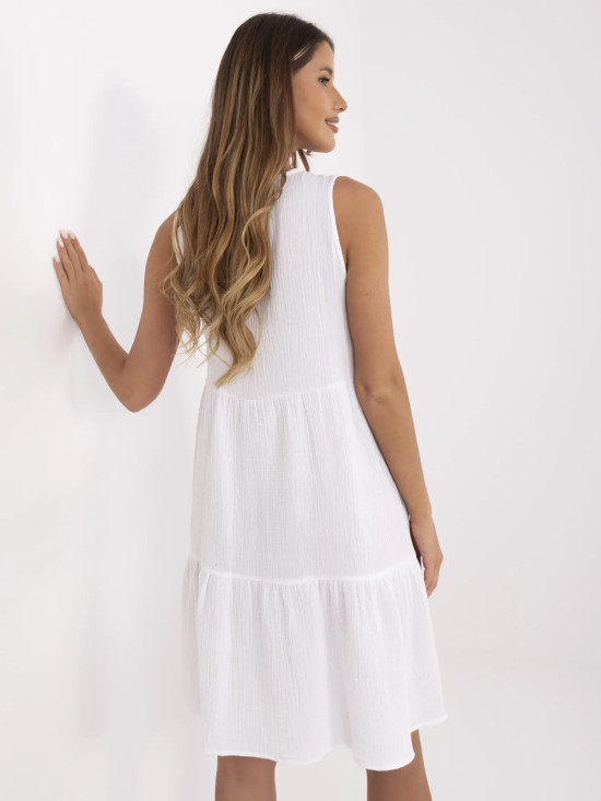 Bílé rozšířené šaty s volánem
