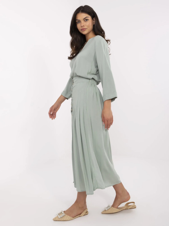Midi sukně v pistáciové barvě