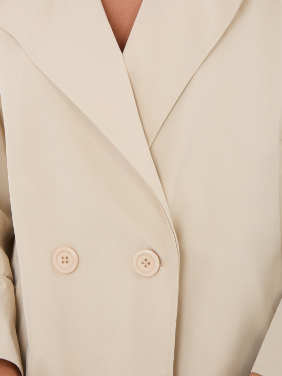 Krátký béžový přechodný kabát s podšívkou