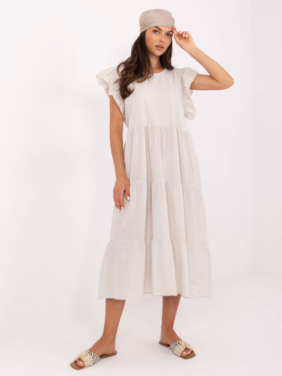 Oversize béžové šaty s volánem