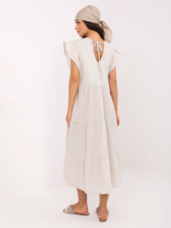 Oversize béžové šaty s volánem