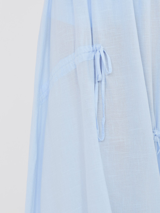 Světle modrá midi sukně s vázáním