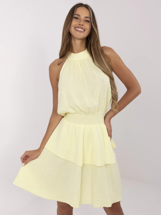 Světle žluté minišaty s volánem a vázáním
