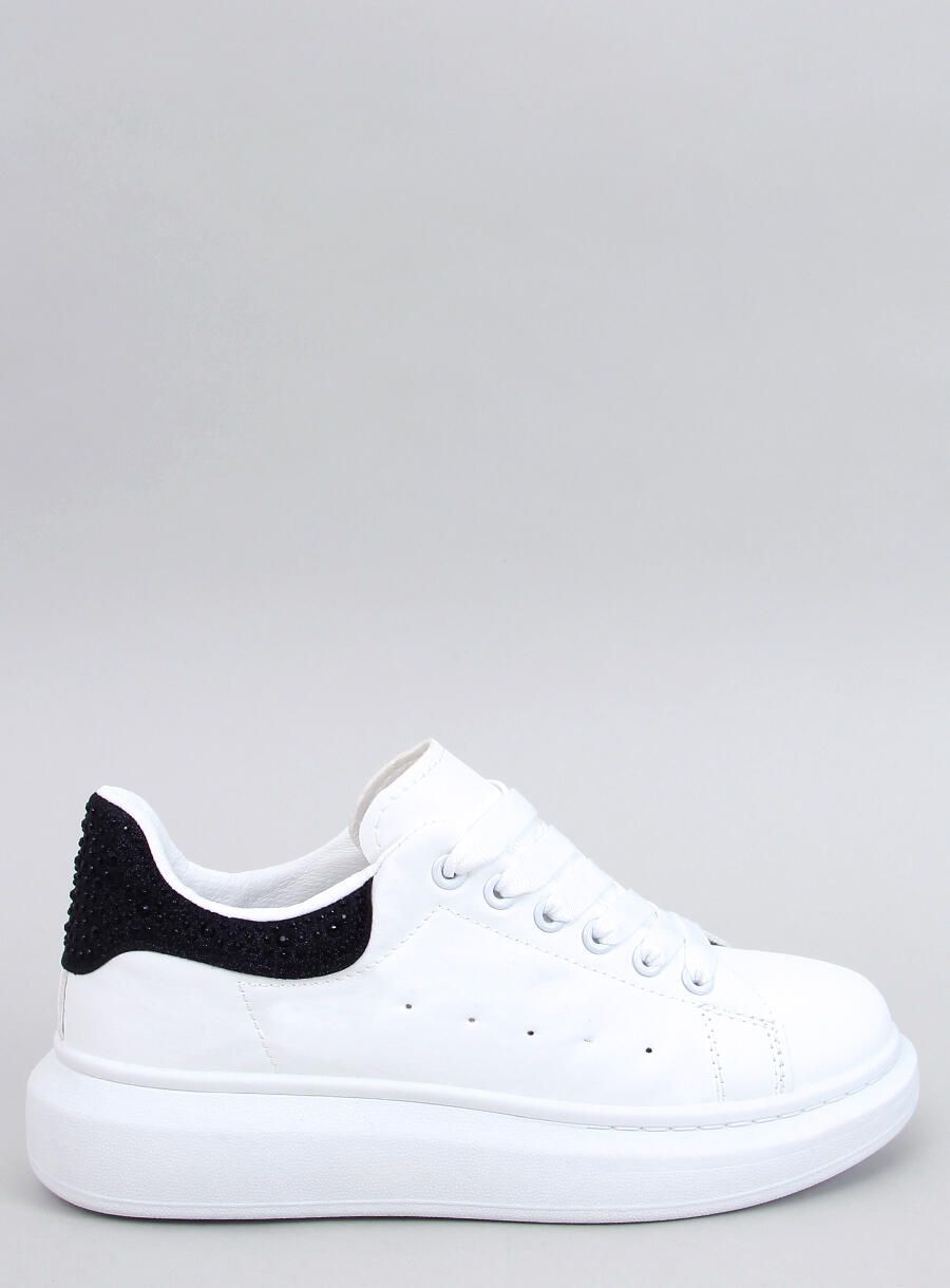 Bílé tenisky na platformě s černým detailem