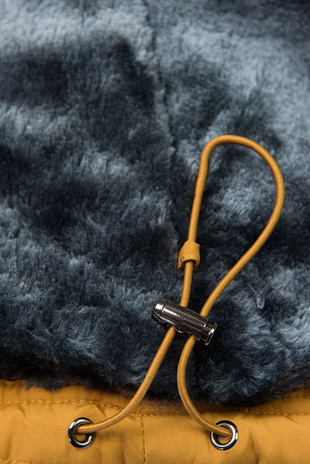 Žlutá zimní bunda s šedým plyšem