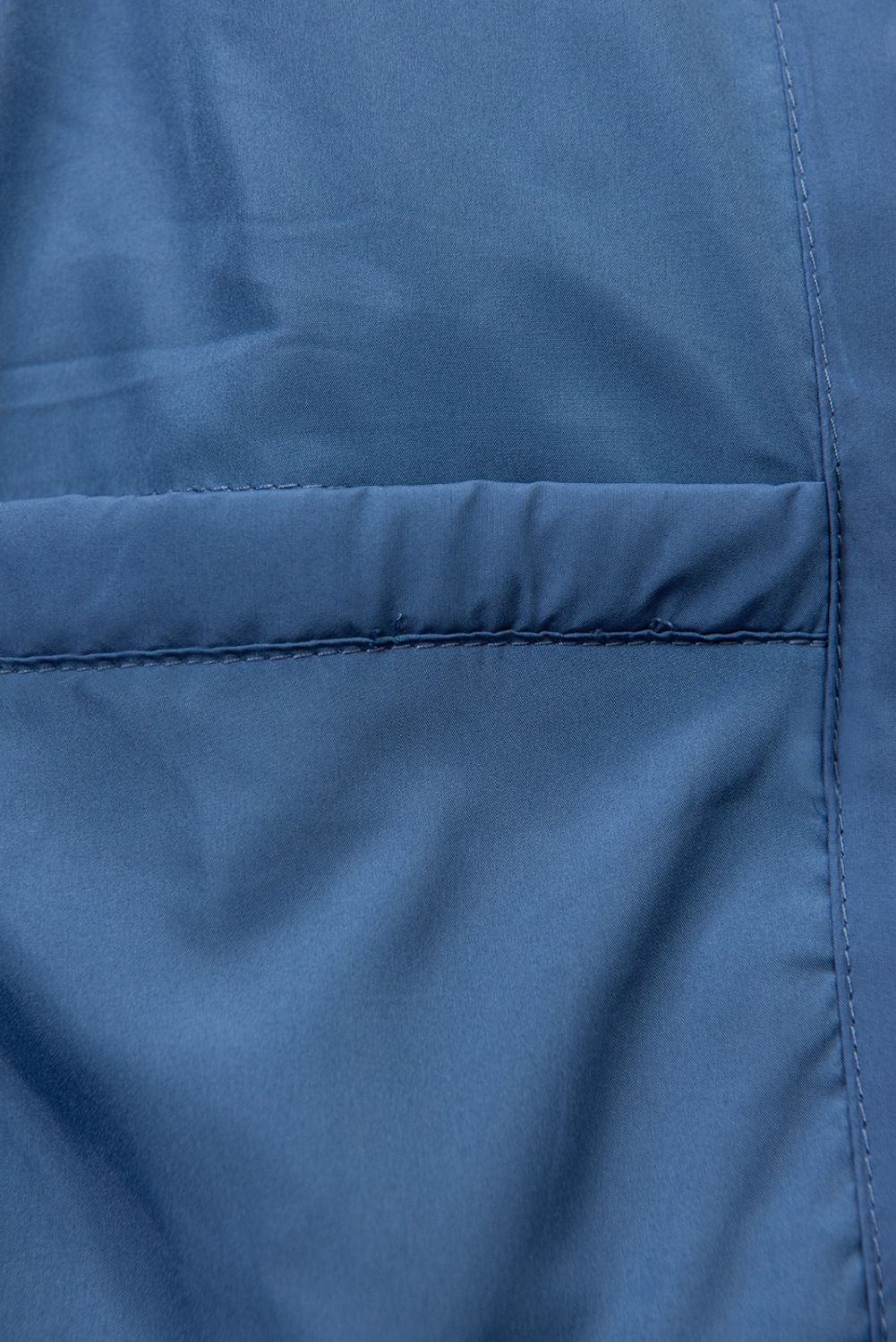 Modrá zimní prošívaná bunda s kožešinou