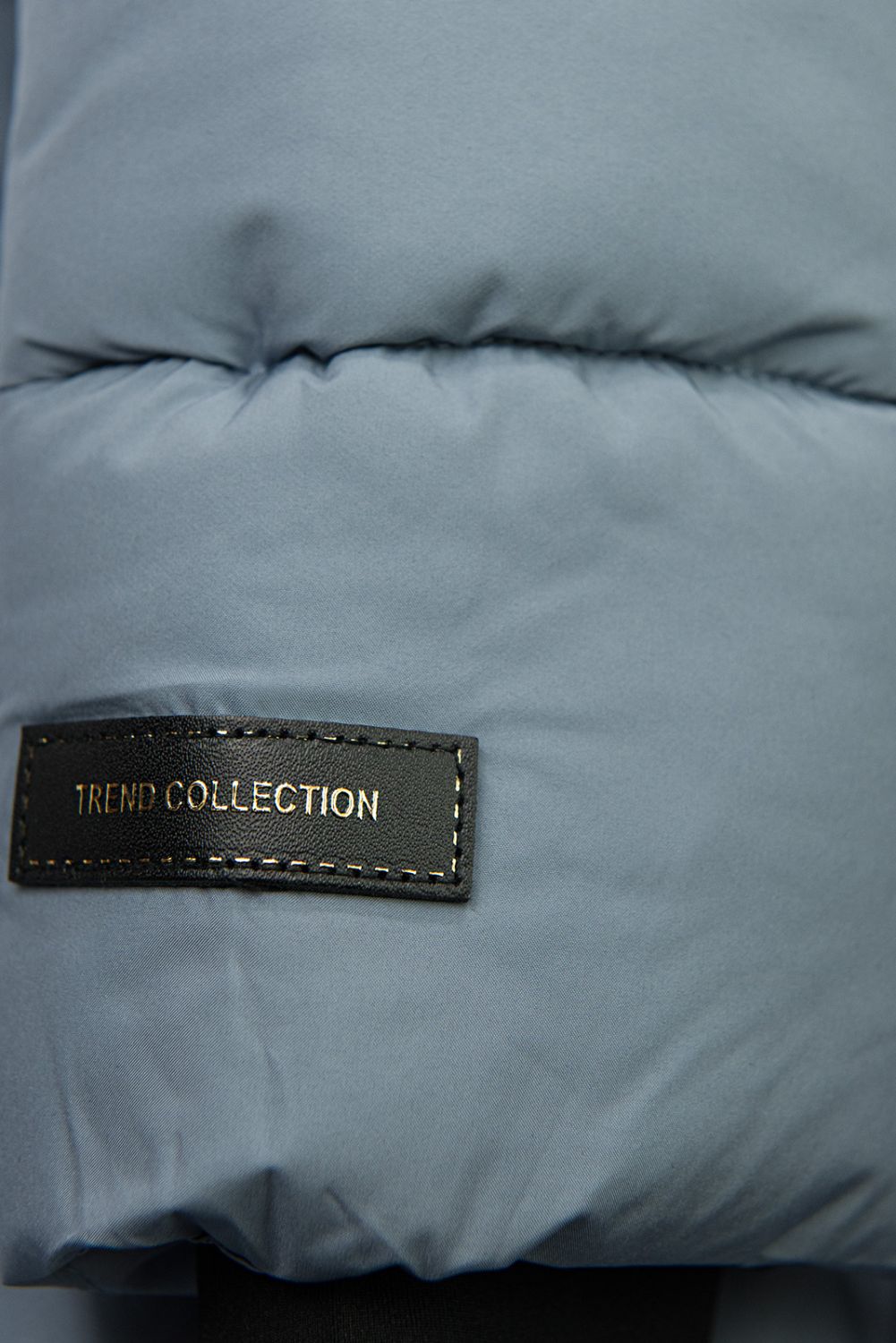 Ocelově modrá dámská zimní bunda s kapucí