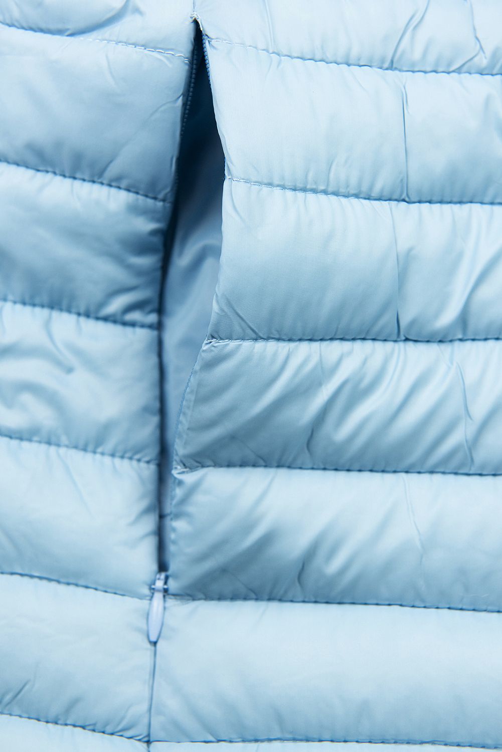 Světle modrá bunda s elastickým pasem