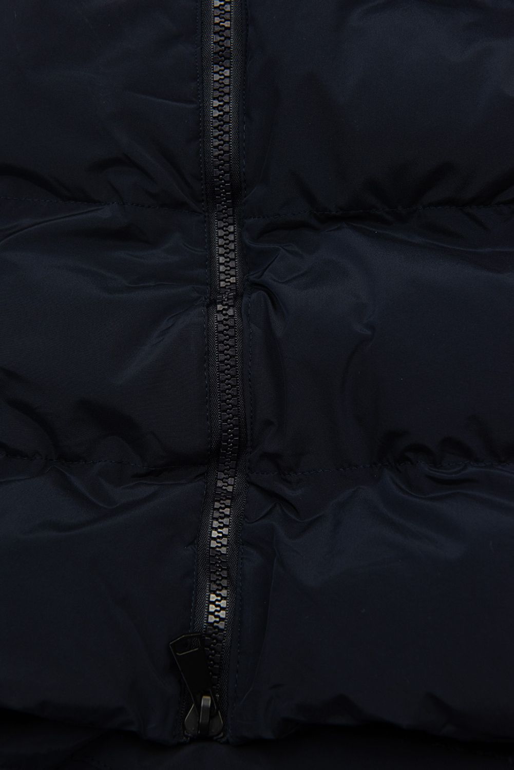 Tmavě modrá dlouhá prošívaná vesta