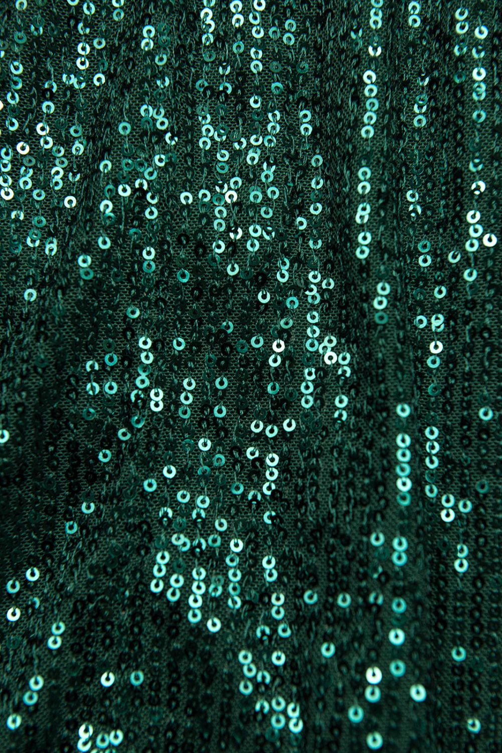 Smaragdově zelené šaty s flitry