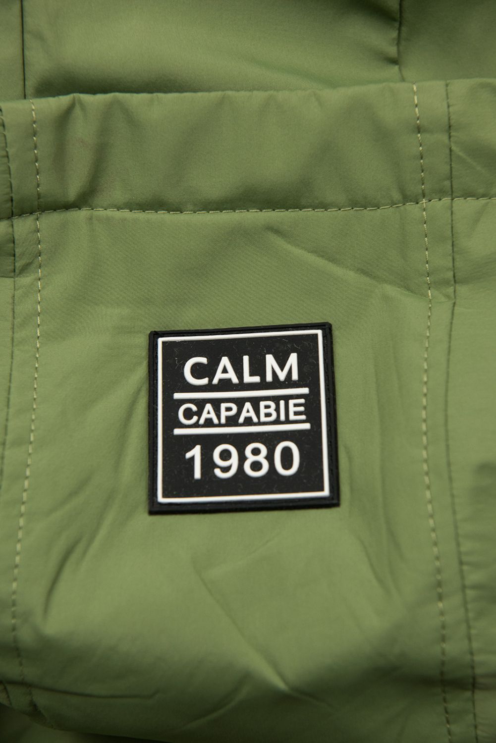 Tmavě zelená přechodná parka CALM