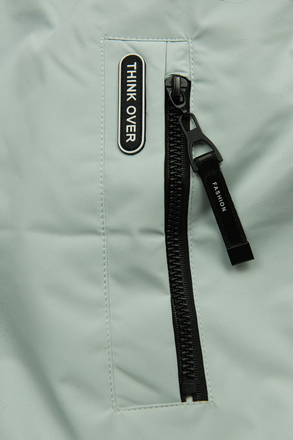 Mátově zelená jarní parka s vysokým límcem