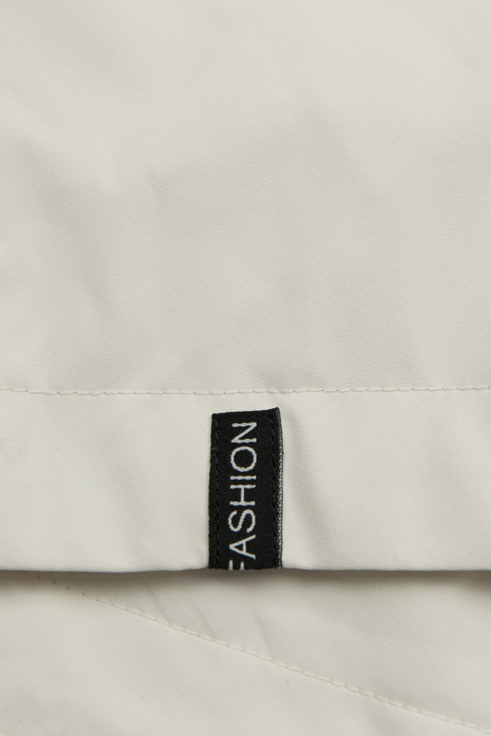 Krémová jarní parka s vysokým límcem