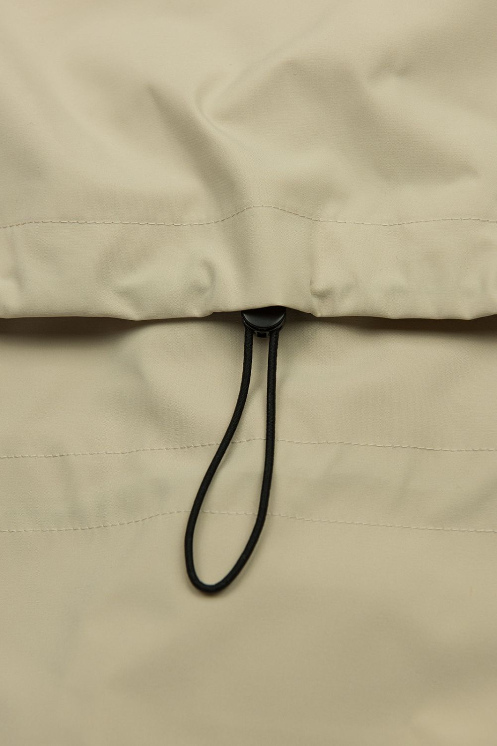 Béžová jarní parka se stahováním v pase