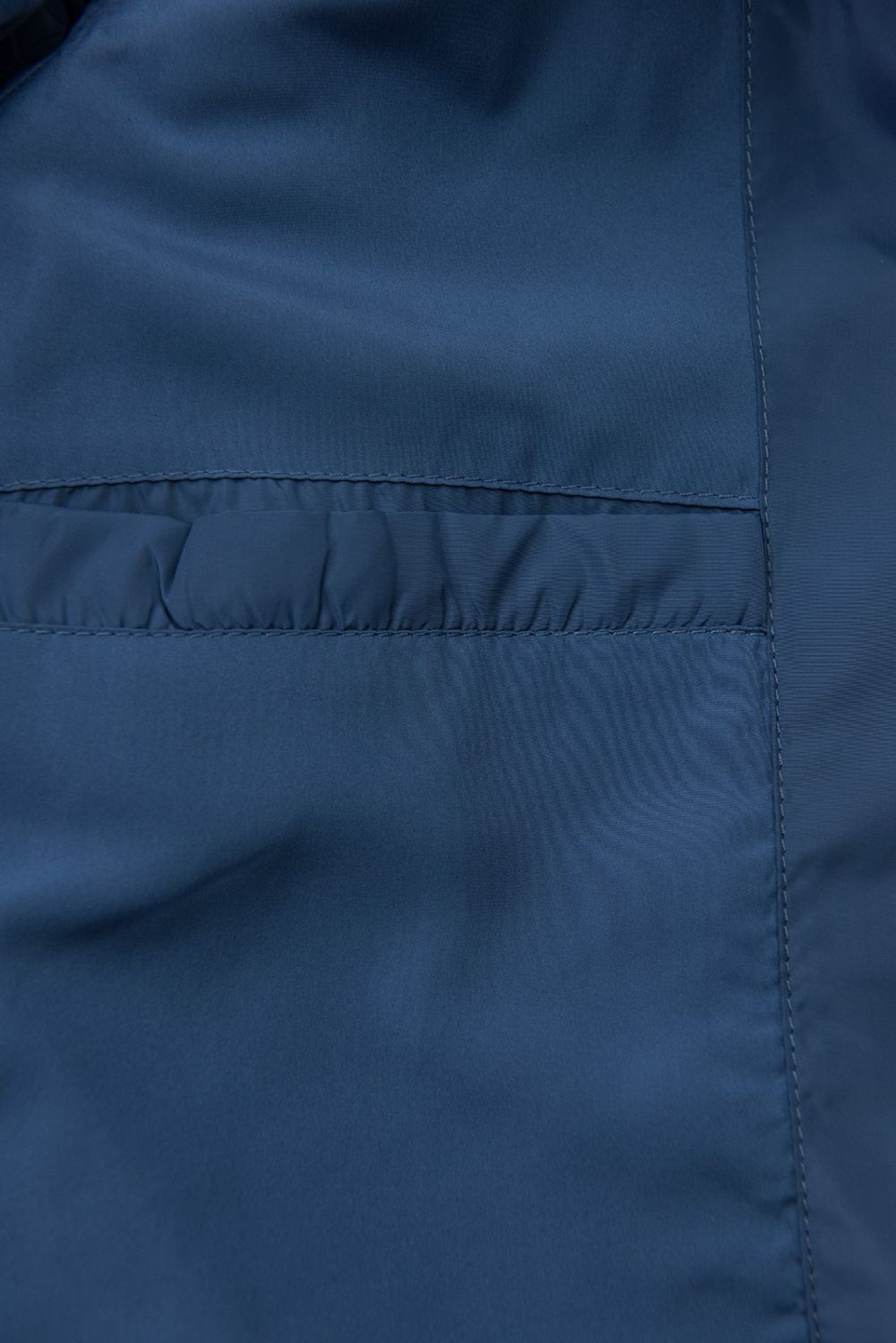 Modrá prošívaná bunda s páskem