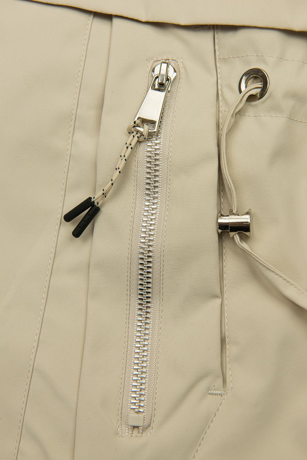 Prodloužená parka s potiskem v kapuci světle béžová