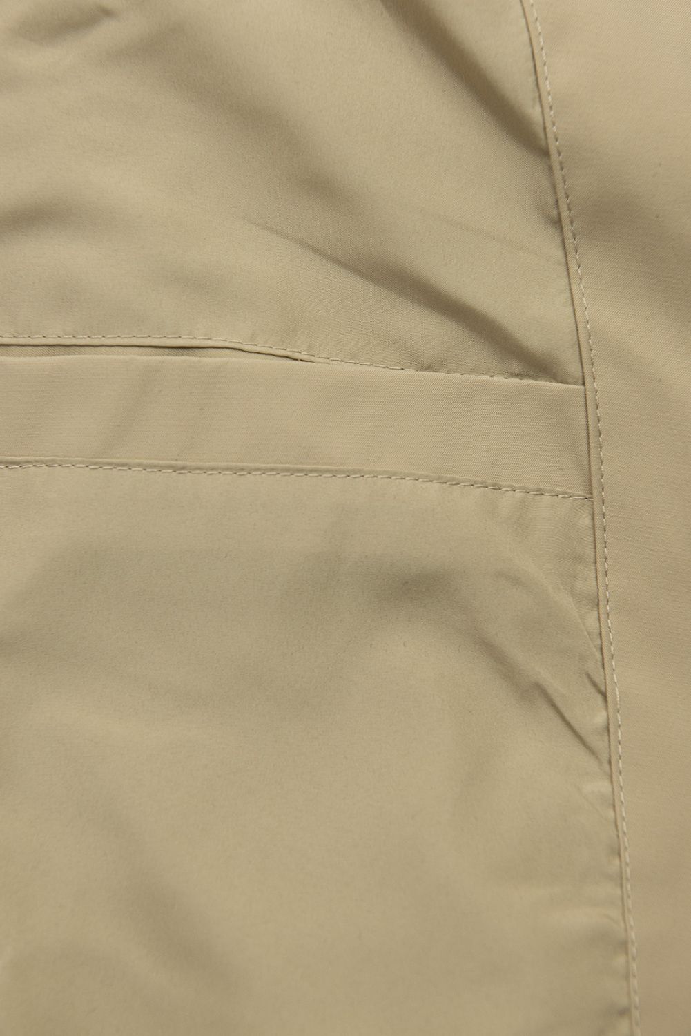 Prodloužená parka s potiskem v kapuci béžová