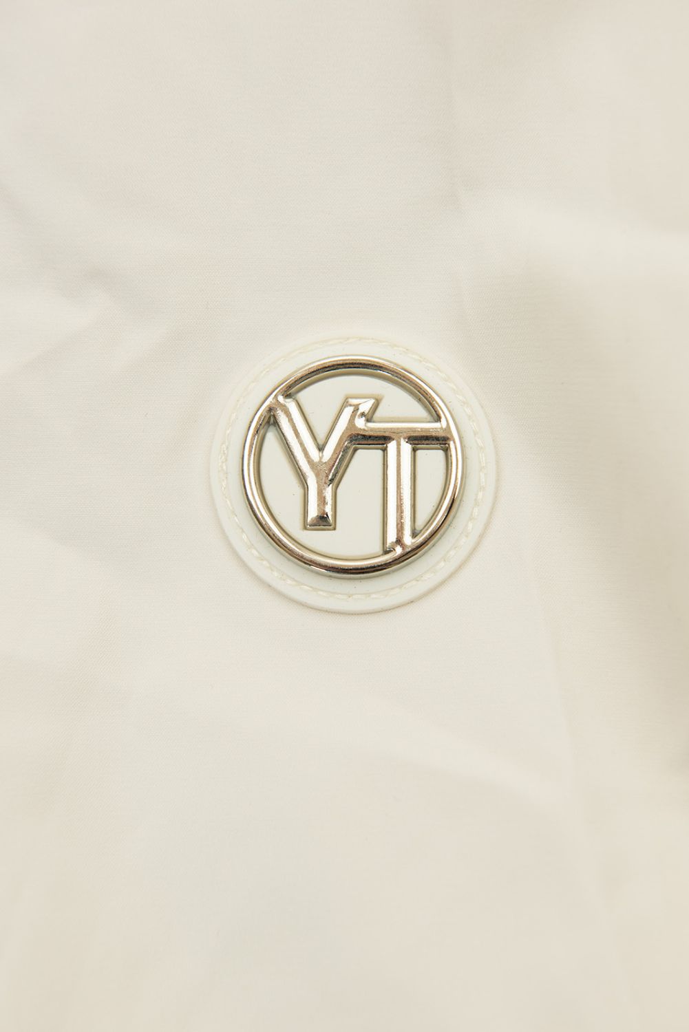 Ecru jarní parka s velkou kapucí