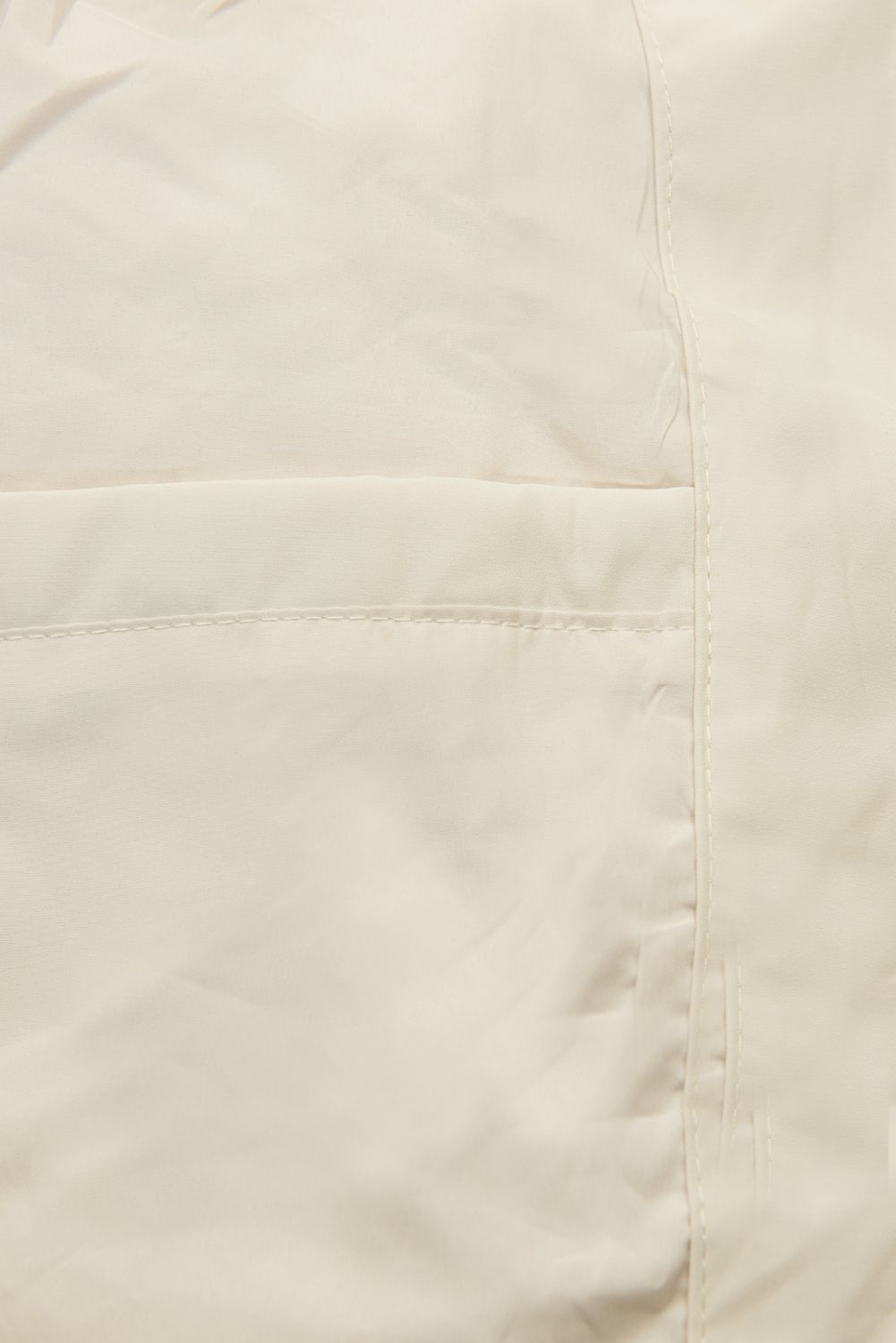 Ecru jarní parka s velkou kapucí