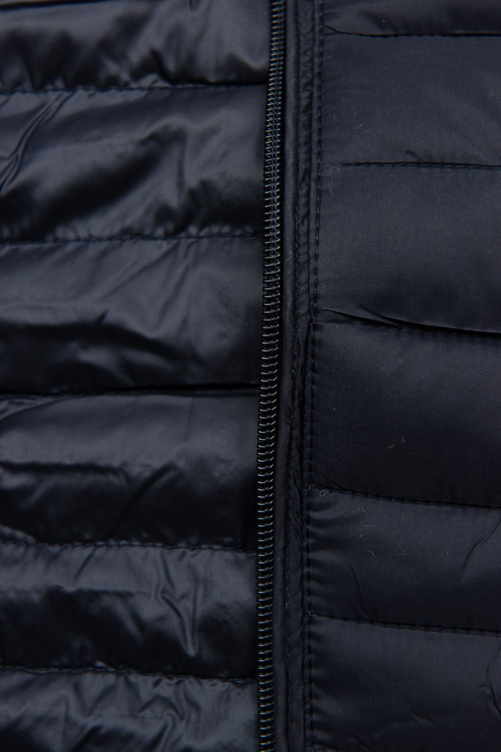 Tmavě modrá prošívaná bunda na přechodné období
