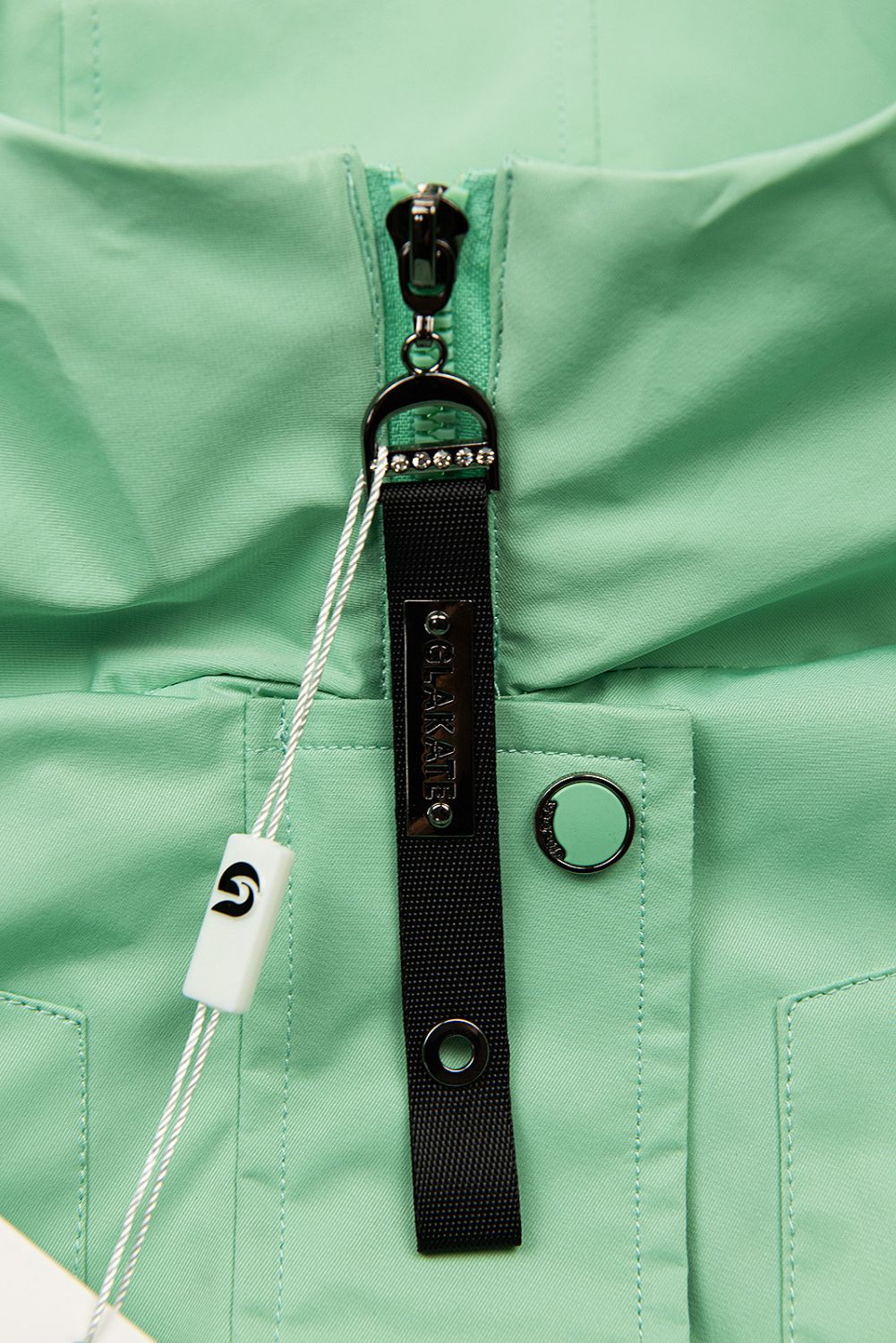 Přechodný plášť jarní zelená