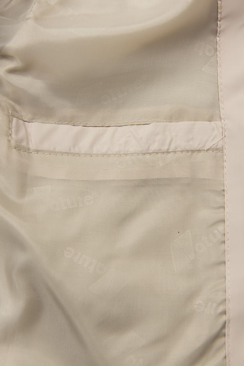 Přechodná bunda v prodlouženém střihu béžová