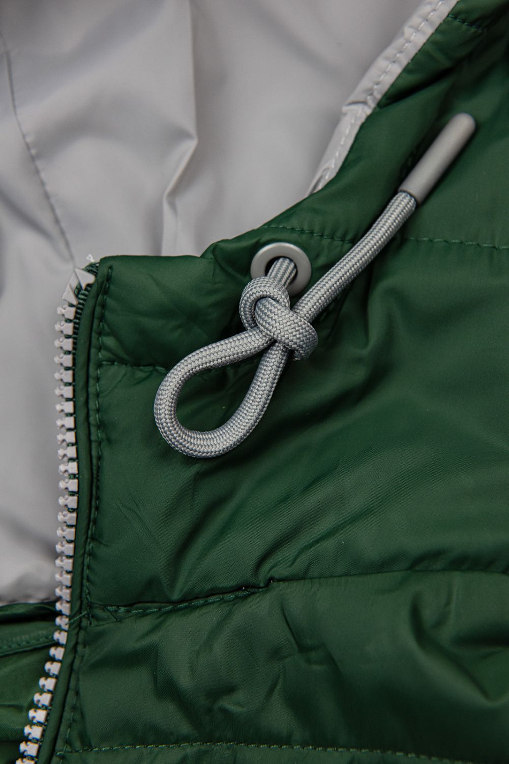 Prošívaná lehká bunda tmavě zelená