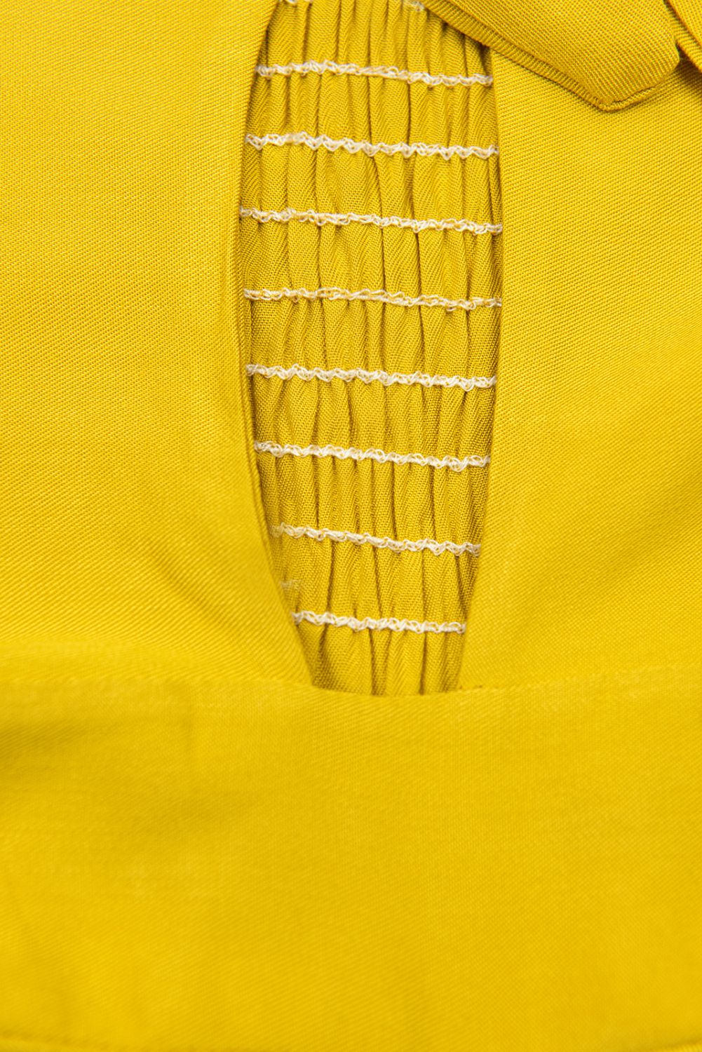 Žlutý kalhotový overal