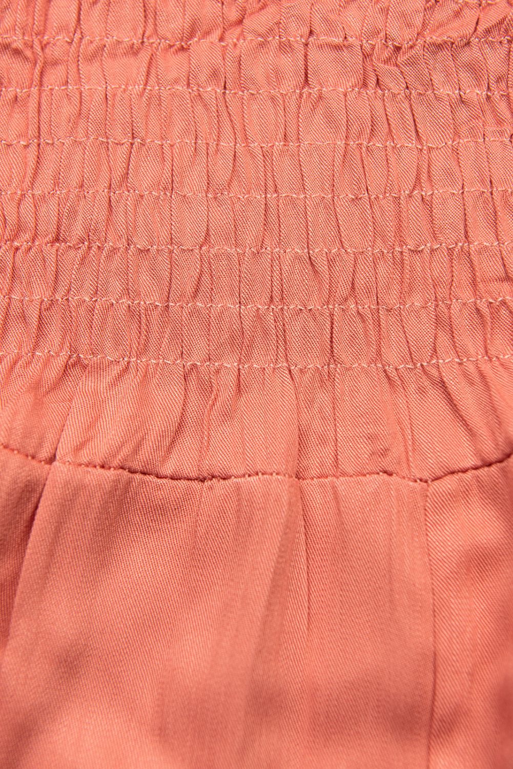 Lososově růžový kalhotový overal