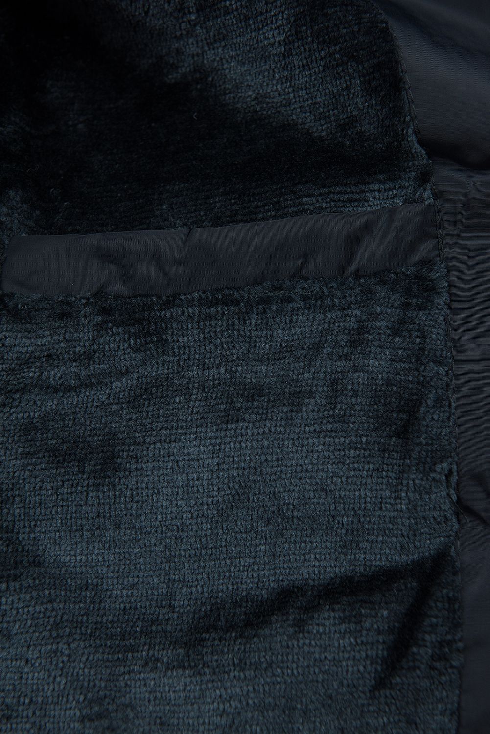 Prošívaná přechodná bunda tmavě modrá