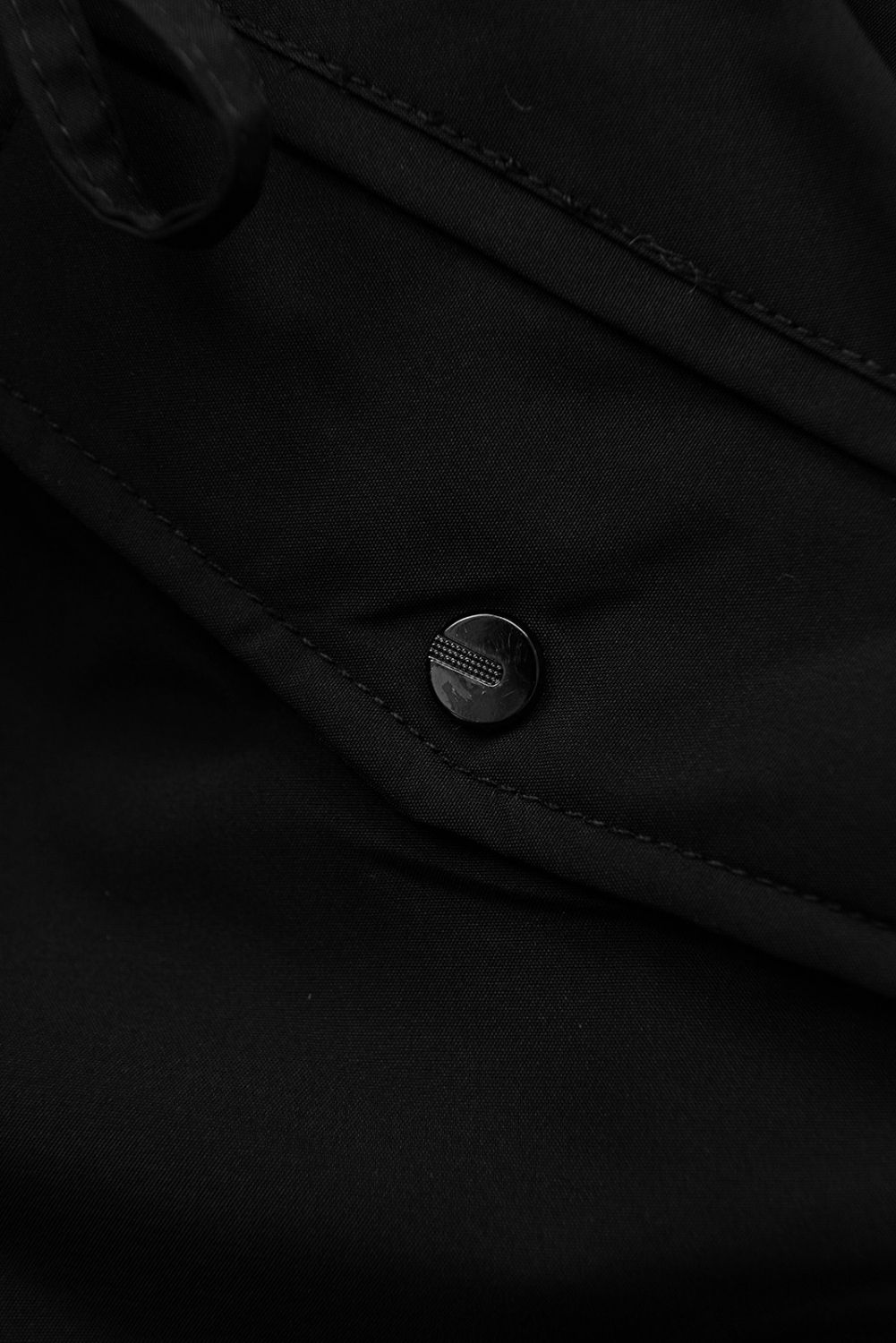 Zimní parka v prodlouženém střihu s kožešinou černá