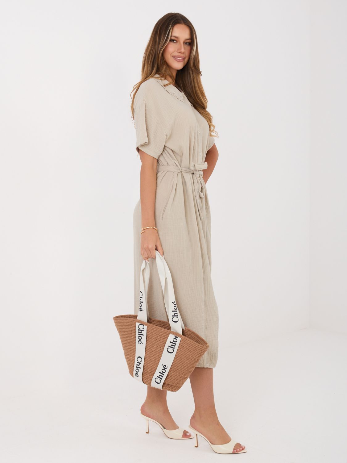 Béžové rozšířené midi šaty s páskem a kapsami