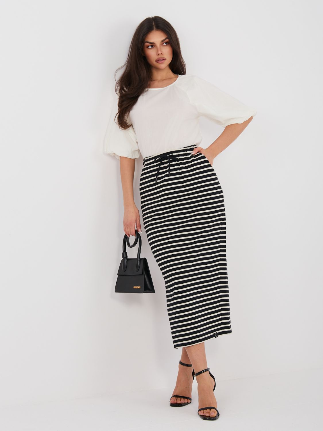 Černá midi sukně s proužky a kapsami