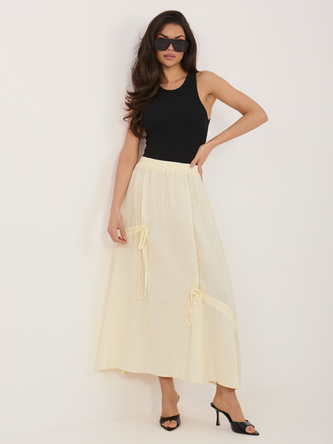 Žlutá midi sukně s vázáním