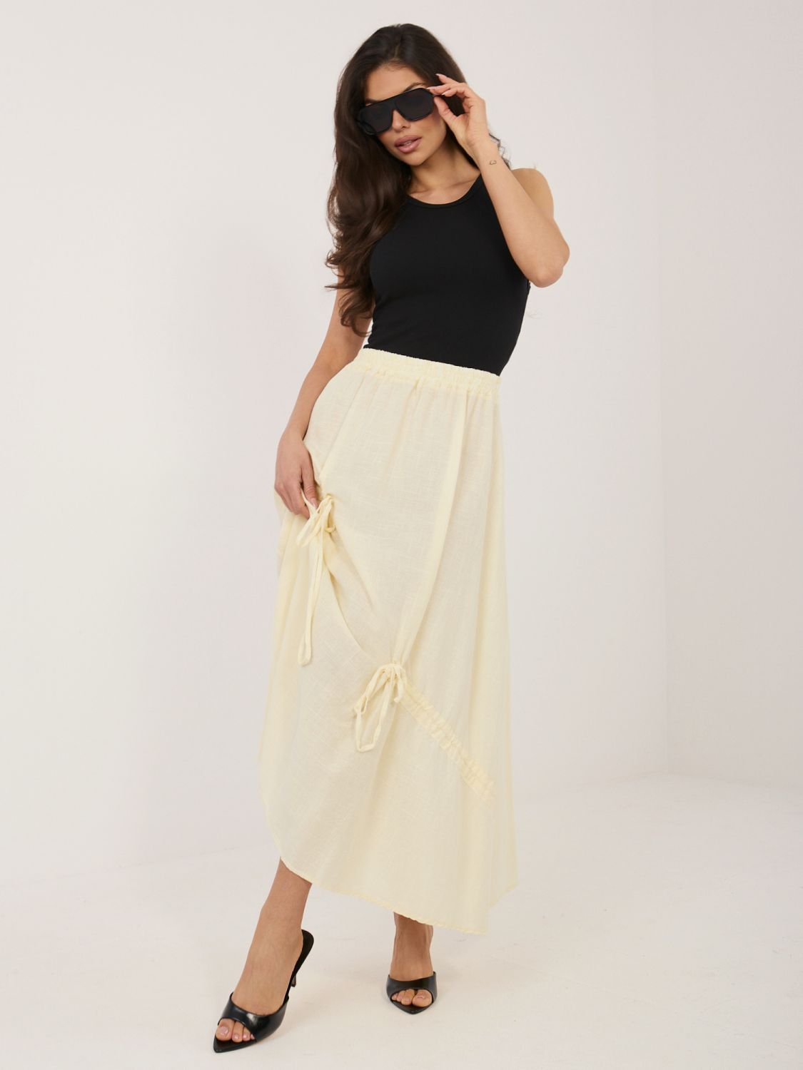 Žlutá midi sukně s vázáním