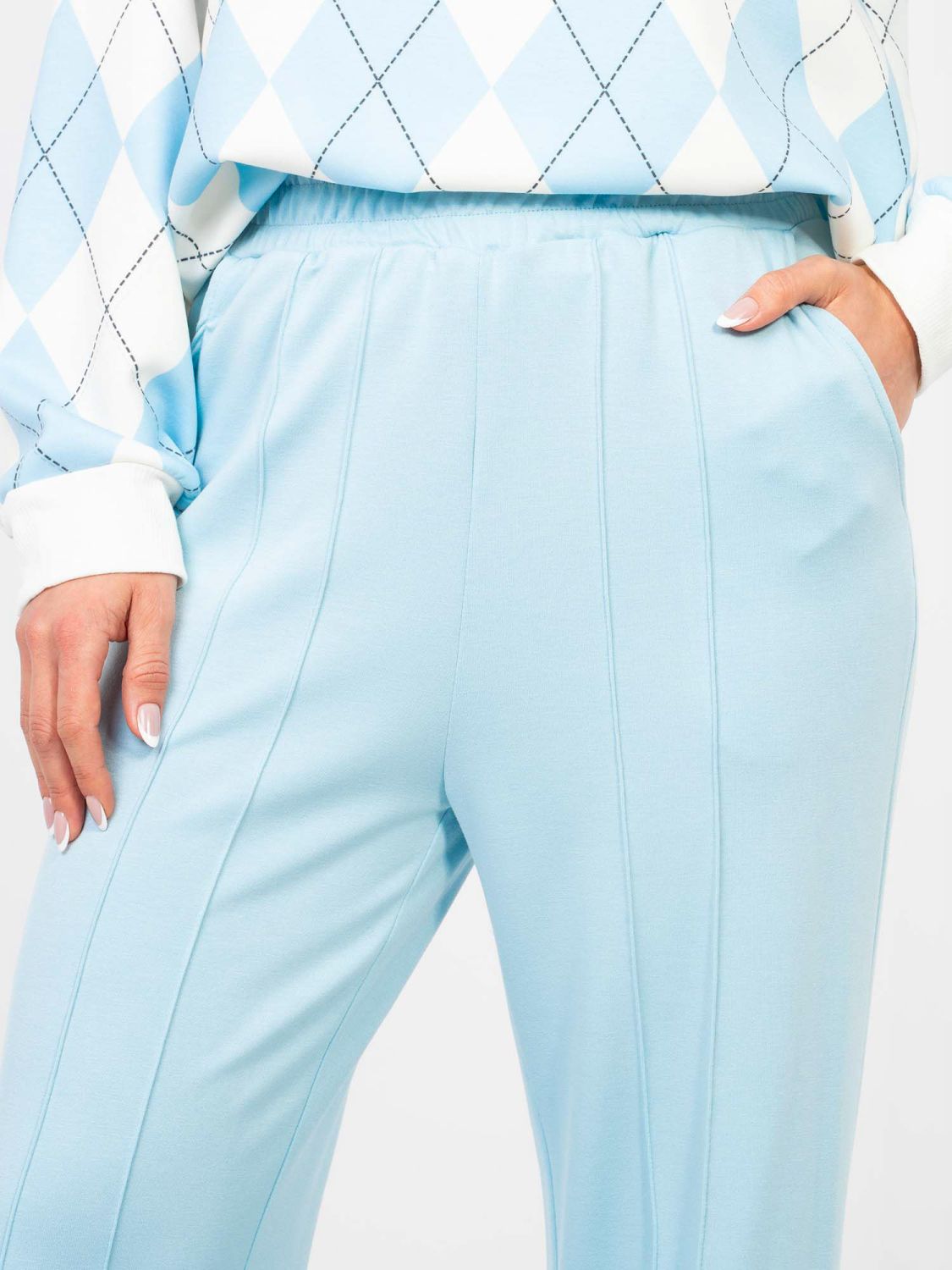 Dámské široké teplákové kalhoty ve světle modré barvě