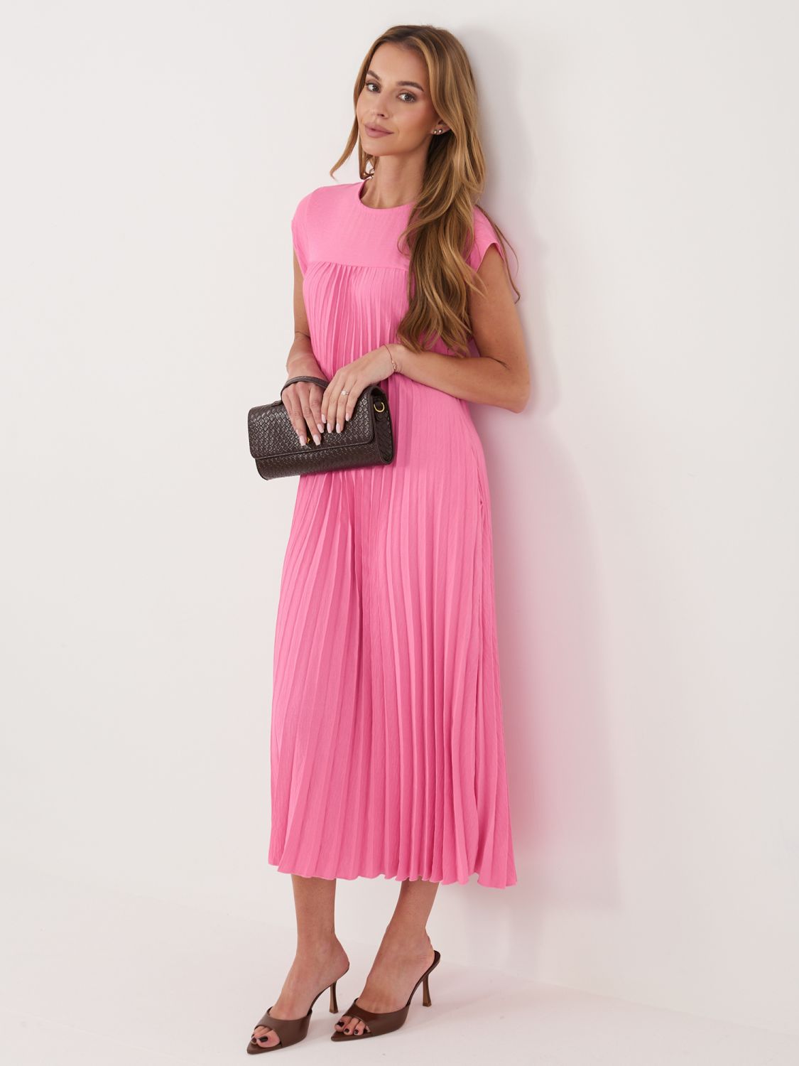 Růžové midi koktejlové šaty s kapsami