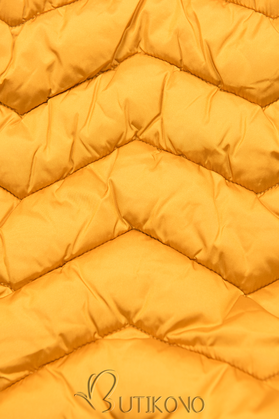 Zimní prošívaná bunda s páskem žlutá