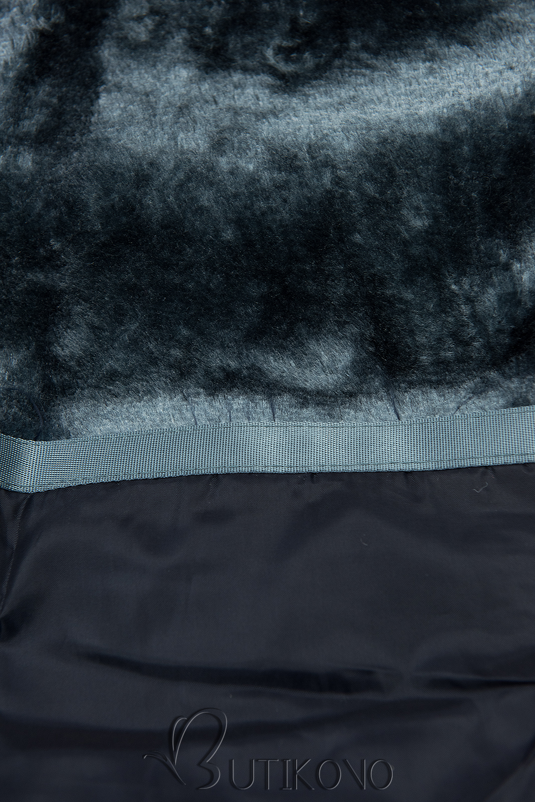 Tmavě modrá zimní bunda v prodlouženém střihu